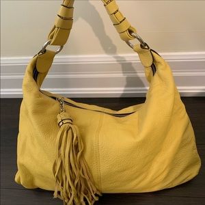 Danier yellow hobo bag